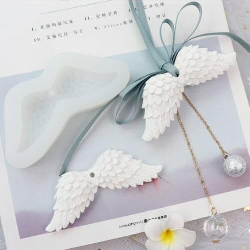 Angel wings aromatherapy gypsum silicone mold car pendant decorative aromatherapy stone DIY material wings drop glue mold
