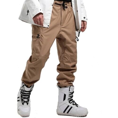 New Tie Feet Wearab Womens and Men Ice and Snow Pants Snowboarding Clothing Trousers Skiing Suit Wear 15K Waterproof Overalls