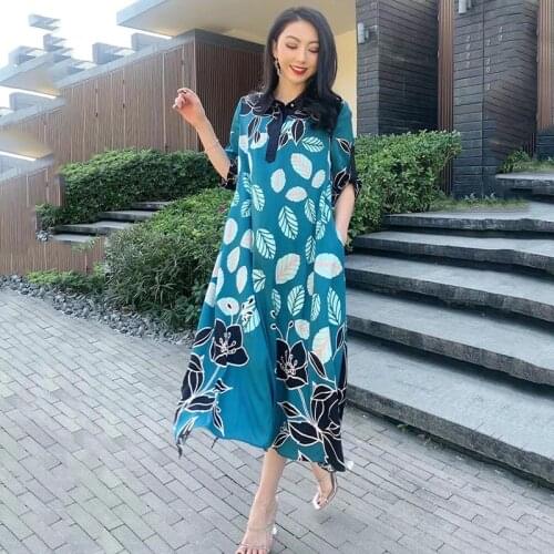 Heavy-weight silk crepe de chine dress is a new summer dress for women with intellectual POLO collar printed loose MIDI skirt