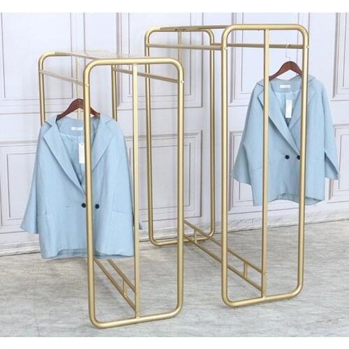 Clothing store hanger display rack floor-to-ceiling gold womens clothing store in the island double row of childrens clothing