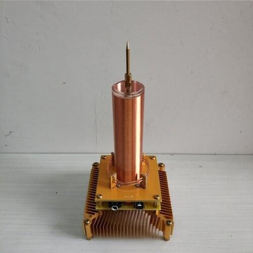 Tesla coil plays music ion windmill wreath spacer lamp wireless transmission scientific experiment