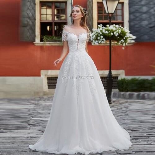 A Line Lace Applique Short Sleeve Wedding Dresses 2019 Sexy Illusion Sweetheart Sheer Back Floor Length Bridal Gowns Sweep Train