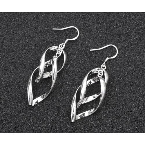 Selling silver jewelry foreign trade selling trendy fashion boutique tassel twisted banana earrings