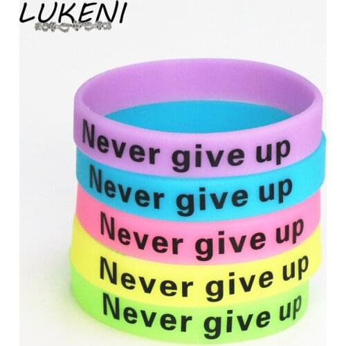 LUKENI 1PC Glow In Dark Silicone Rubber Elasticity Sport Wristband Never Give Up Print Unisex Cuff Bracelet Candy Color SH095