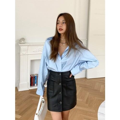 2021 Autumn Catwalk new leather skirt sheepskin high-waist buttocks skirt A-line single-row buckled skirt woman fashion clothing