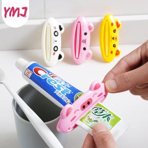 1PCS Cartoon Toothpaste Dispenser Clip-on Tube Squeezer Home Tube Squeezer Easy Tooth Paste Rolling Holder Bathroom Accessories