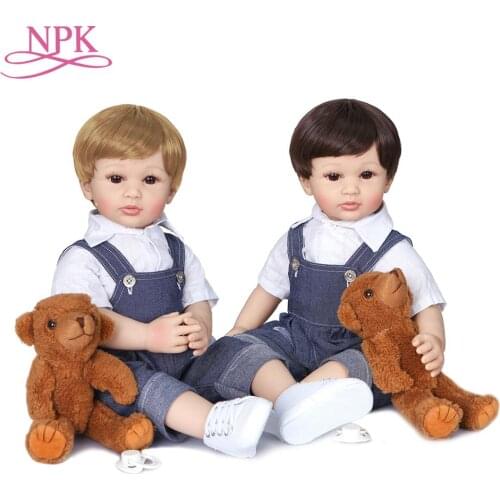60CM NPK lifelike bebe doll reborn baby soft Silicone cloth body boy baby doll for childrens birthday gifts has two colors hair