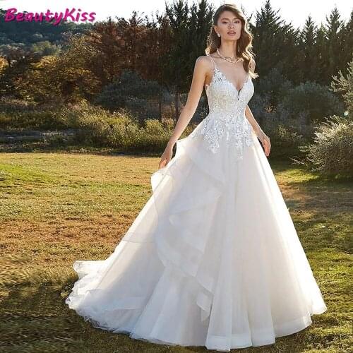 Luxury V-neck Ball Gown Wedding Dress 2020 Beading Appliques Princess Ivory Tulle Ruffles Bridal Gowns Plus Size
