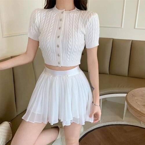 Make firm offers fashion knitting dew navel shirt with short sleeves women take a pleated high-waisted short skirts tide
