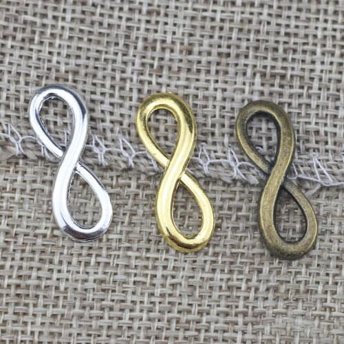 High Quality 50 PCS/Lot 8.3mm*23.6mm Antique Silver plated Or Antique Bronze Diy Handmade Infinity Symbol Pendant Charms Lot