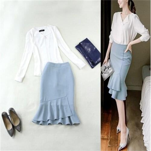 Fashion suit female summer New high-quality OL white lapel long-sleeved shirt + bag hip lotus swing half skirt Two-piece set