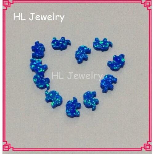 Hill-san Lotus Wholesale 8x11mm Opal Synthetic Blue Fire Opal Elephant