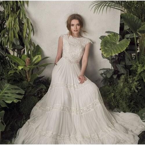 Bohemian Wedding Dress 2021 Boho Lace A-line Open Back Bridal Gowns Vintage Long Bride Dresses Sweep Train Sleeveless Beach New