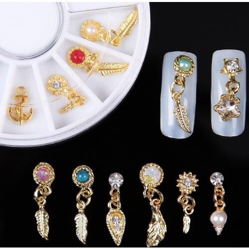 Monja 12pcs/box Nail Art Gold Metal 3D Design Feather Charming Pendant Rhinestone Glitter Decoration Accessories Wheel