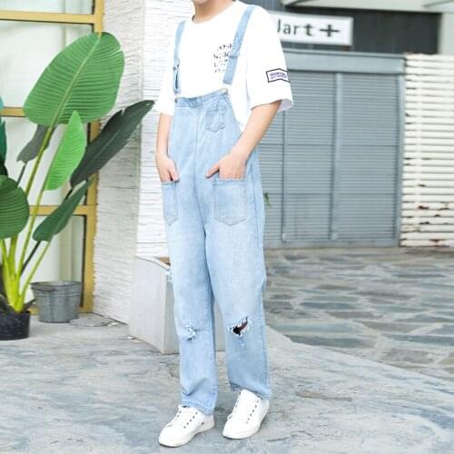 Summer tide mens big hole denim strap pants bib jumpsuit loose couple Korean version of the pants sling