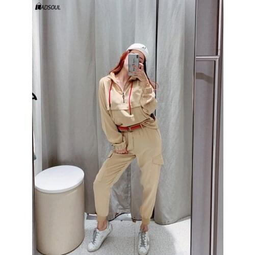 Fashion all match simple Womens wear is versatile with slim casual pullover solid color pocket top + jogging trouser suit