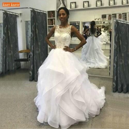 Illusion Arabic Wedding Gowns Sleeveless Beaded Pearls Organza Ball Gown Wedding Dress Long 2020 Arab Custom Made Bridal Dresses
