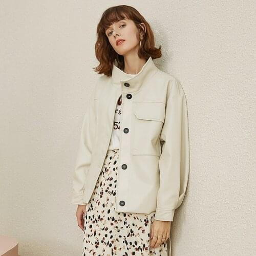 Lautaro Autumn Button up faux leather shirt women belt stand collar long sleeve White leather jacket women High Fashion 2021