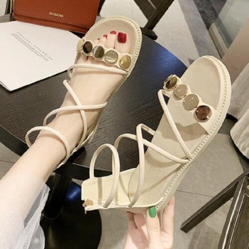 Casual Fashion Metal Decoration Flat Bottom Beach Shoes Ladies Sandals Summer New Hollow Solid Color Roman Shoes Large Size 40