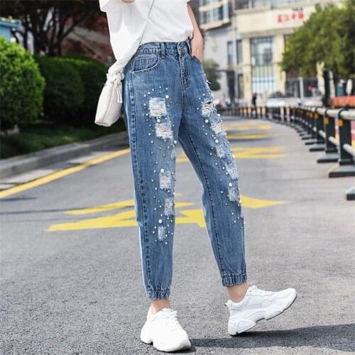 Free shipping 2020 womens spring and summer new high waist harem jeans Ankle-Length pants rotten holes were thin student wild