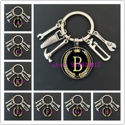 New Product Black Gold English Letter A-Z Round Glass Keychain New Tool Hammer Wrench Saw Electric Drill Pendant Keychain