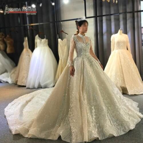 Long sleeves high quality heavy beading wedding dress 100% real work same as on photo