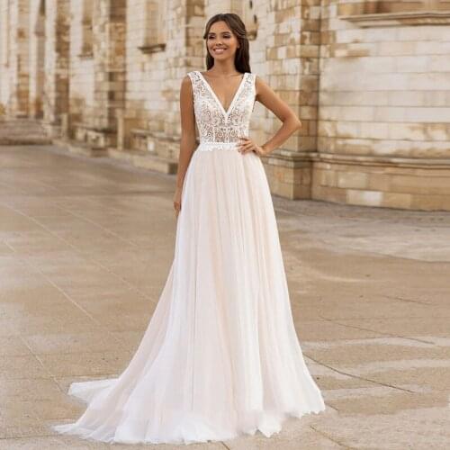 Bohemian Simple Wedding Dresses 2021 Tulle Princess V-Neck Backless Elegant Bridal Gowns Vintage Lace A-Line Vestido De Novia