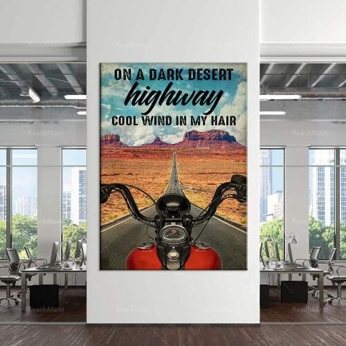 Motorcycle lovers riding a bike on a dark road. The cool wind of the desert blows in my hair. Live home decoration wall art post