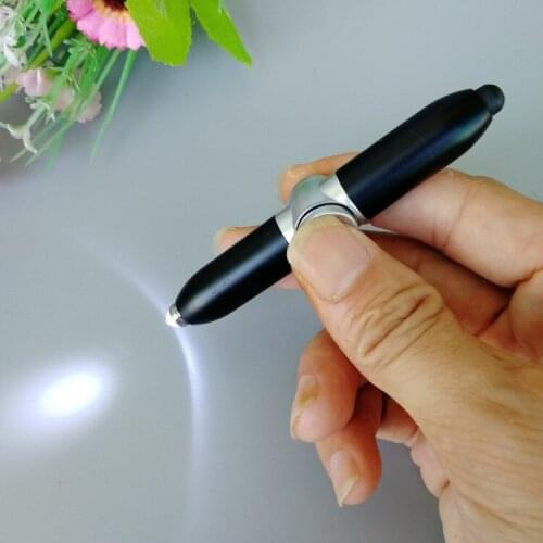 Factory sales school students gift flashing creative toys turn led lamp decompression ballpoint pen rotary flashlight pen