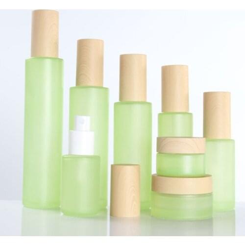 500Pcs 20g 50g 20ml 30ml 40ml 50ml 60ml 80ml 100ml 120ml green Frost Glass Cream Jar with Wooden line Cap Lotion Spray bottle