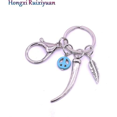 Fashion Keychain Plated Ancient Peace Circle Ngau Taulin Feather Retro Keychain Bohemian Lady Bag Keychain Jewelry
