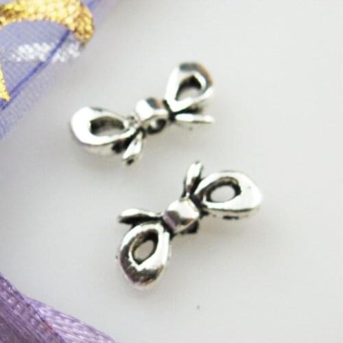 New 70Pcs Tibetan Silver Color Butterfly Knot Spacer Beads Charms 6x12mm