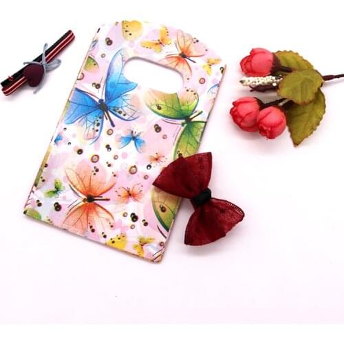 50pcs/lot Colorful Butterfly Printed Plastic Jewelry Bags 9x15cm Gift Candy Soap Packaging Bags with Handle for Jewelry Storage