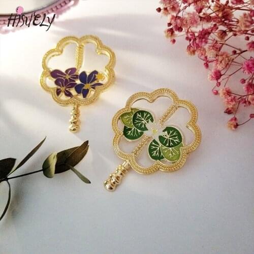 Fashion creative retro plant gold-plated fan brooch elegant skirt clothing pin accessories badge to send girls gifts