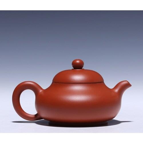 Yixing pure handmade teapot Kung Fu tea set Zhu mud jade milk ball hole out water 170cc wholesale