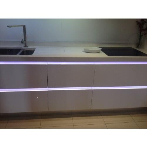 Handle free kitchen cabinet with LED light