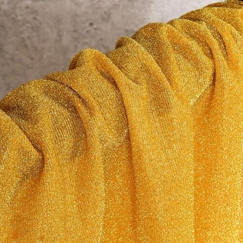 Deep gold yellow grain sky star bright silk flash dazzling color cloth dress background cloth clothing fabric