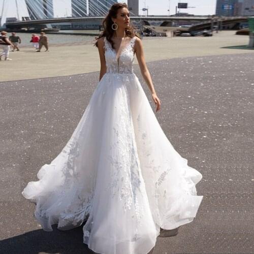 Sexy Sheer V Neck Wedding Dresses Robe De Mariee Off Shoulder Sleeveless Lace Appliques A Line Tulle Bridal Wedding Gowns