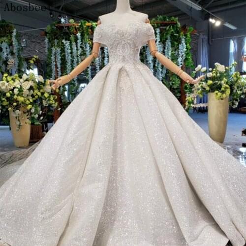 Beautiful Long Train Wedding Dress 2021 New Off Shoulder Wedidng Gown Beading Top Sleeveless Lace Up Back