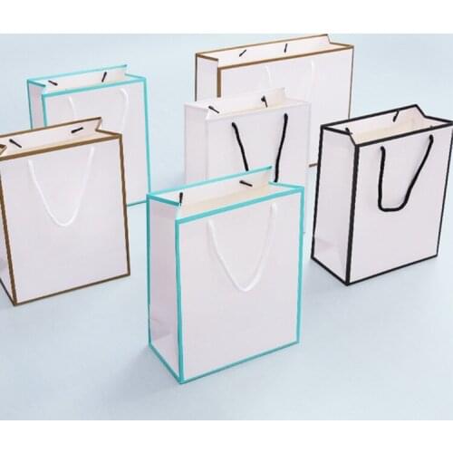 100PCS/LOT New Design 4 Color 3 Size Available Paper Gift Bag Wedding Favor Candy Portable Bag Clothes Packaging Bag