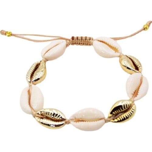 LUXjewelry Natural White cowrie shells bracelet with shell in gold bezel Boho sea shell jewelry