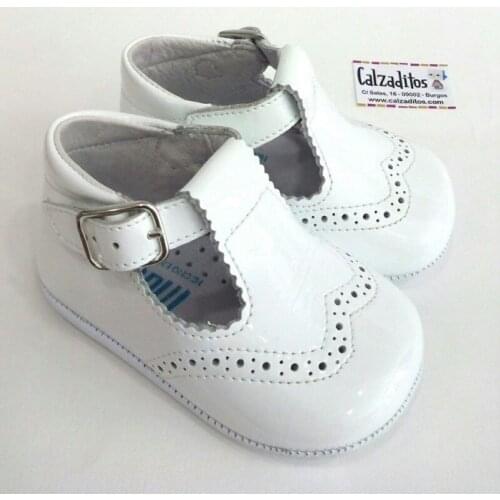 Pepitos de charol de color blanco sin Sola, de Patucos index