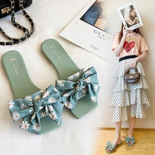 Sandals womens hundred rides outside wearing 2021 summer new bow square head flat bottom anti-slip one-word slipper tide