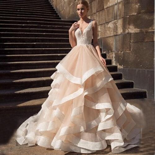 Romantic Champagne Wedding Dresses Vestido de Novia Customized Sexy Backless Ball Gown Bride Dress with Ruffles