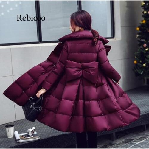 Winter parkas women cotton jacket fashion A-line Down cotton jackets Thick warm long Slim female Bow Big swing cotton coats N247