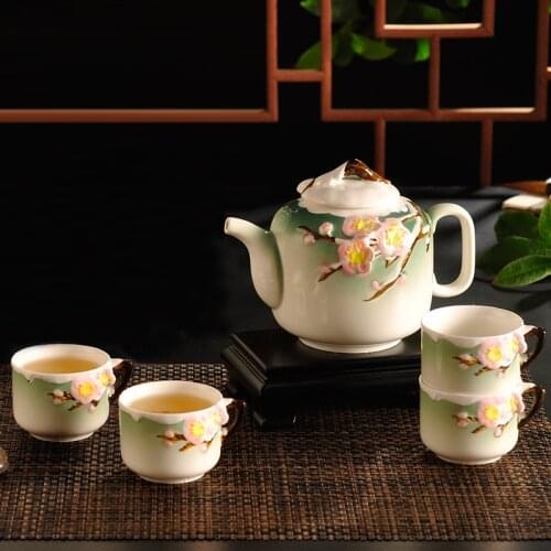 Chinese style plum chrysanthemum stereo ceramic tea set household handmade teapot Kungfu porcelain tea cup teaware 4 cups 1 pot
