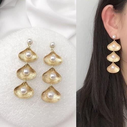 CE - 92 web celebrity with long Korean earrings pearl shells contracted joker new fashion temperament