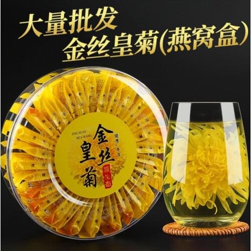 Golden silk chrysanthemum, yellow chrysanthemum, a cup of flower tea in an independent bagged birds nest box