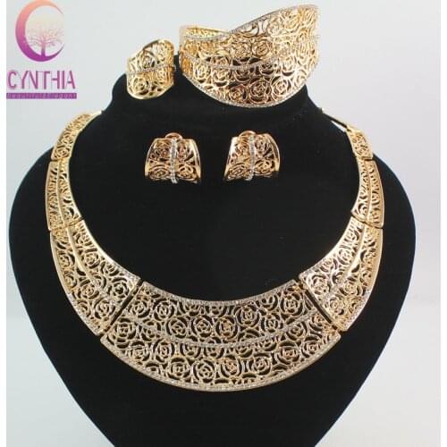 Free Shipping Hollow Crystal Flower Pendant Necklace Bangle Earring Ring Gold color Jewelry Sets For Women Fashion Jewelry