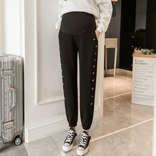 Pregnant womens casual pants autumn and winter wear belly lift pants letter embroidery loose pregnant womens trousers